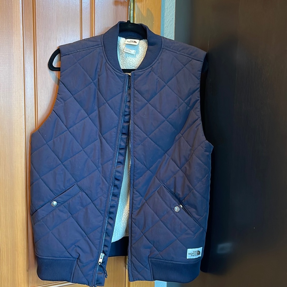 Mens north face vest/ never worn